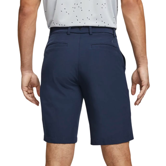 Navy blue golf shorts with a sleek, tailored fit and stretch material.
