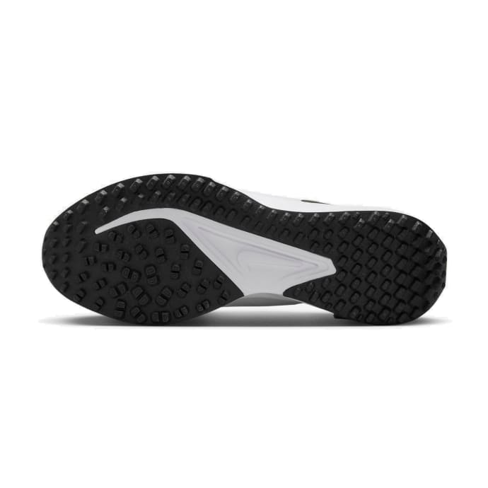White and black nike running shoe with textured sole design.