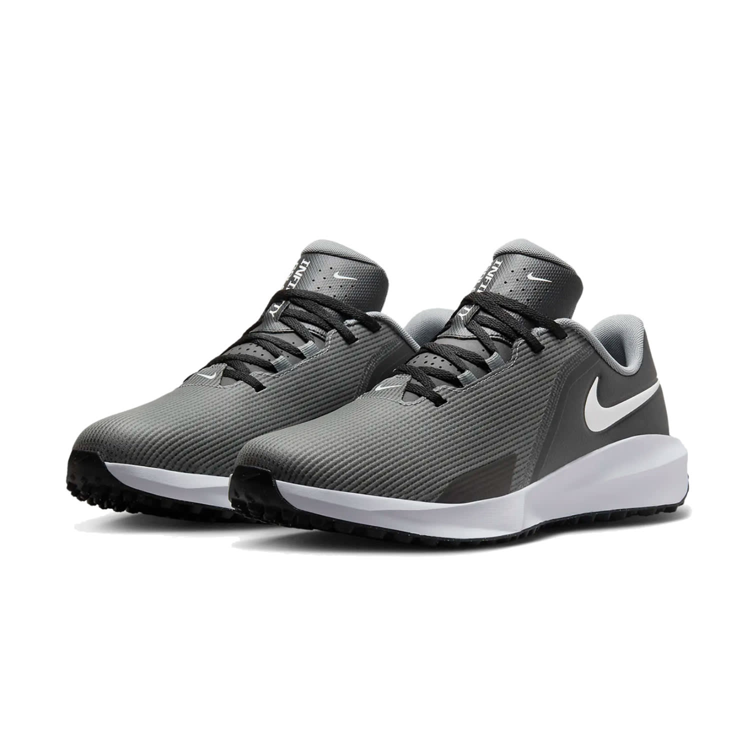 Nike gray and white athletic shoe with textured upper.