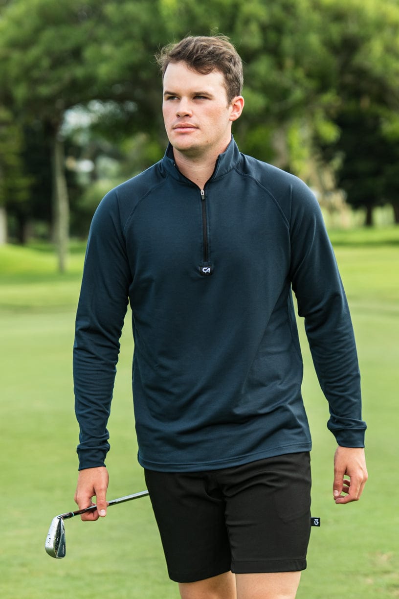 Navy blue quarter-zip golf pullover with a subtle logo on the chest.