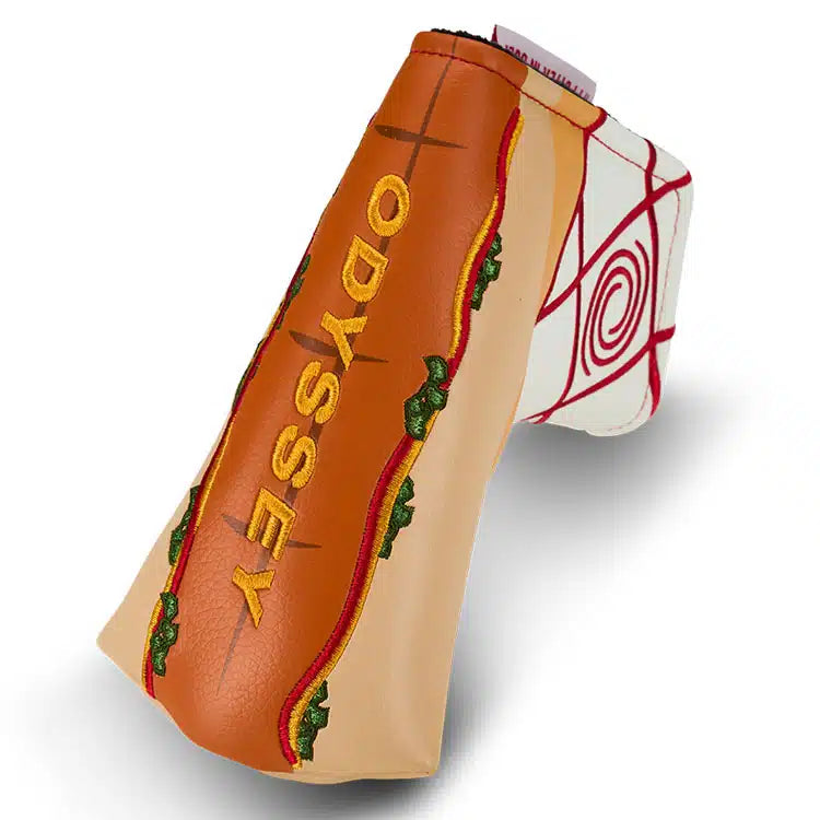 Odyssey-themed golf club head cover with embroidered details and leather-like texture.