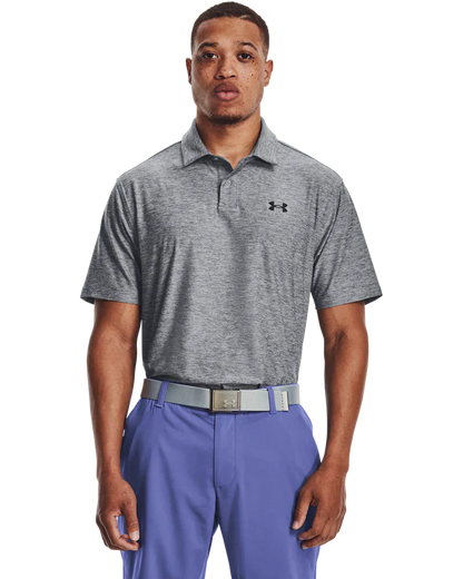 Gray under armour polo shirt with blue pants and white belt